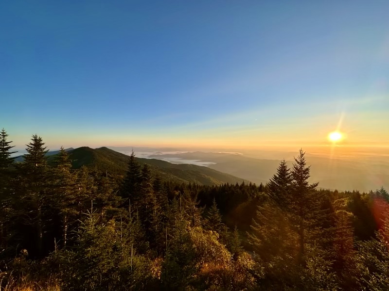 Aerial view of downtown Asheville NC with Blue Ridge Mountains